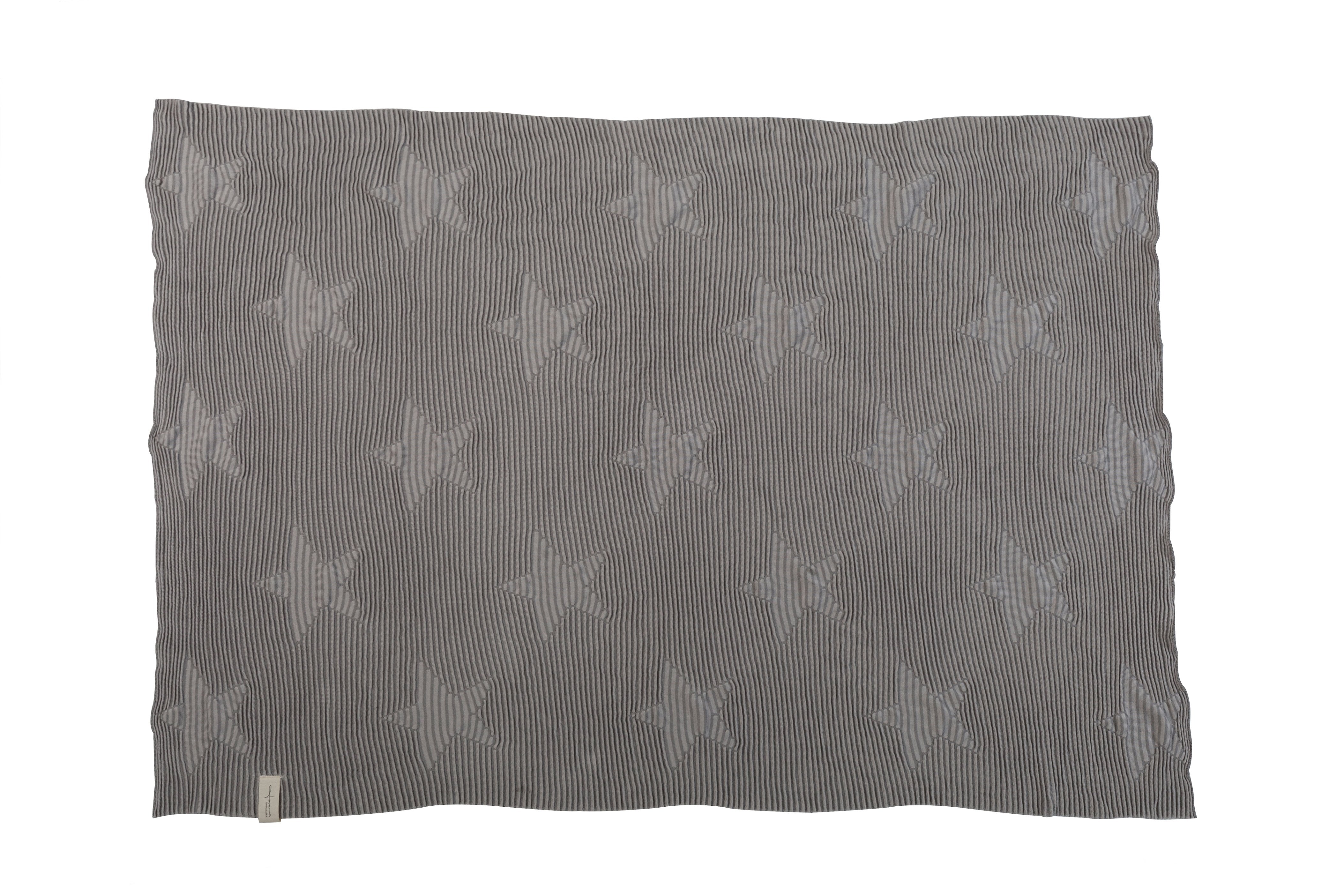 Knitted Hippy Stars Blanket in Pearl Grey design by Lorena Canals
